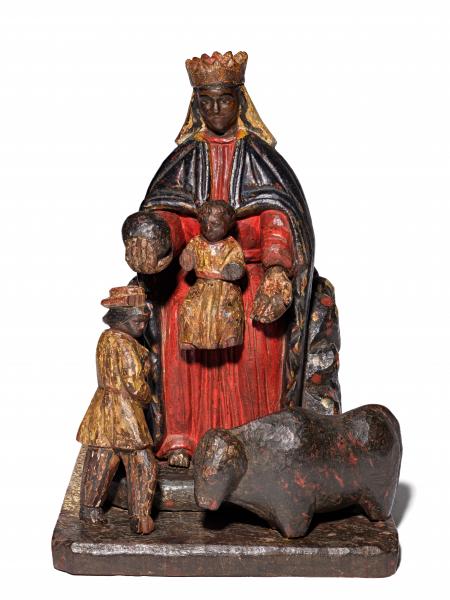Carved and painted figure of Virgin of Monsterrate seated, holding an orb with a child on her lap. A man and a bull are depicted at her feet. 